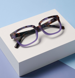 Square purple reading glasses on a white and blue background