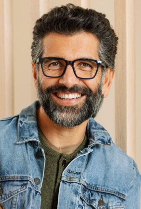 Man wearing amber navy reading glasses