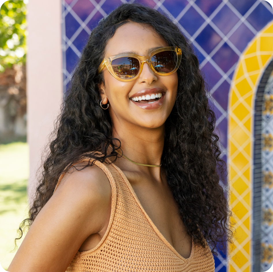 women wearing yellow sunglasses