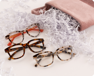 Chai tortoise and tortoise reader flatlay with a pink stocking