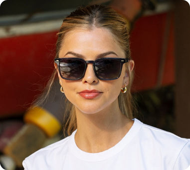 women wearing blue sunglasses outside