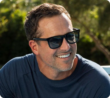 Man wearing black sunglasses outside